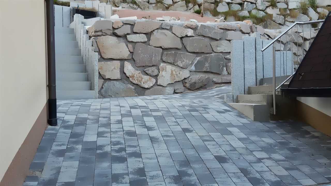 Außenanlagen Pflasterarbeiten Natursteinmauern Treppen